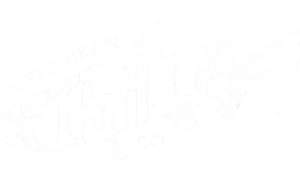 A logo that says Ketchikan Fishing Company thats shaped like a salmon.